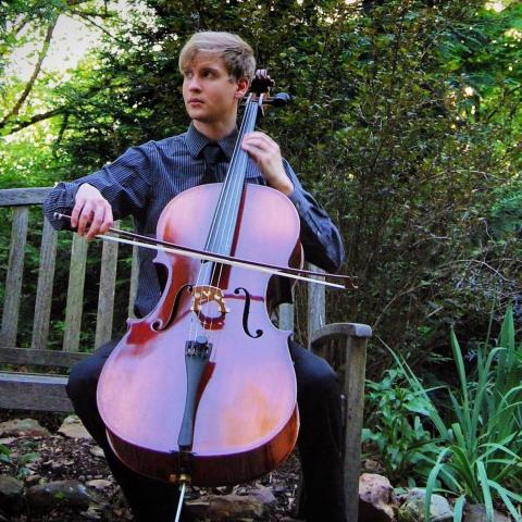 Alex Williams playing cello