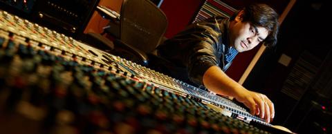 Student at a mixing board